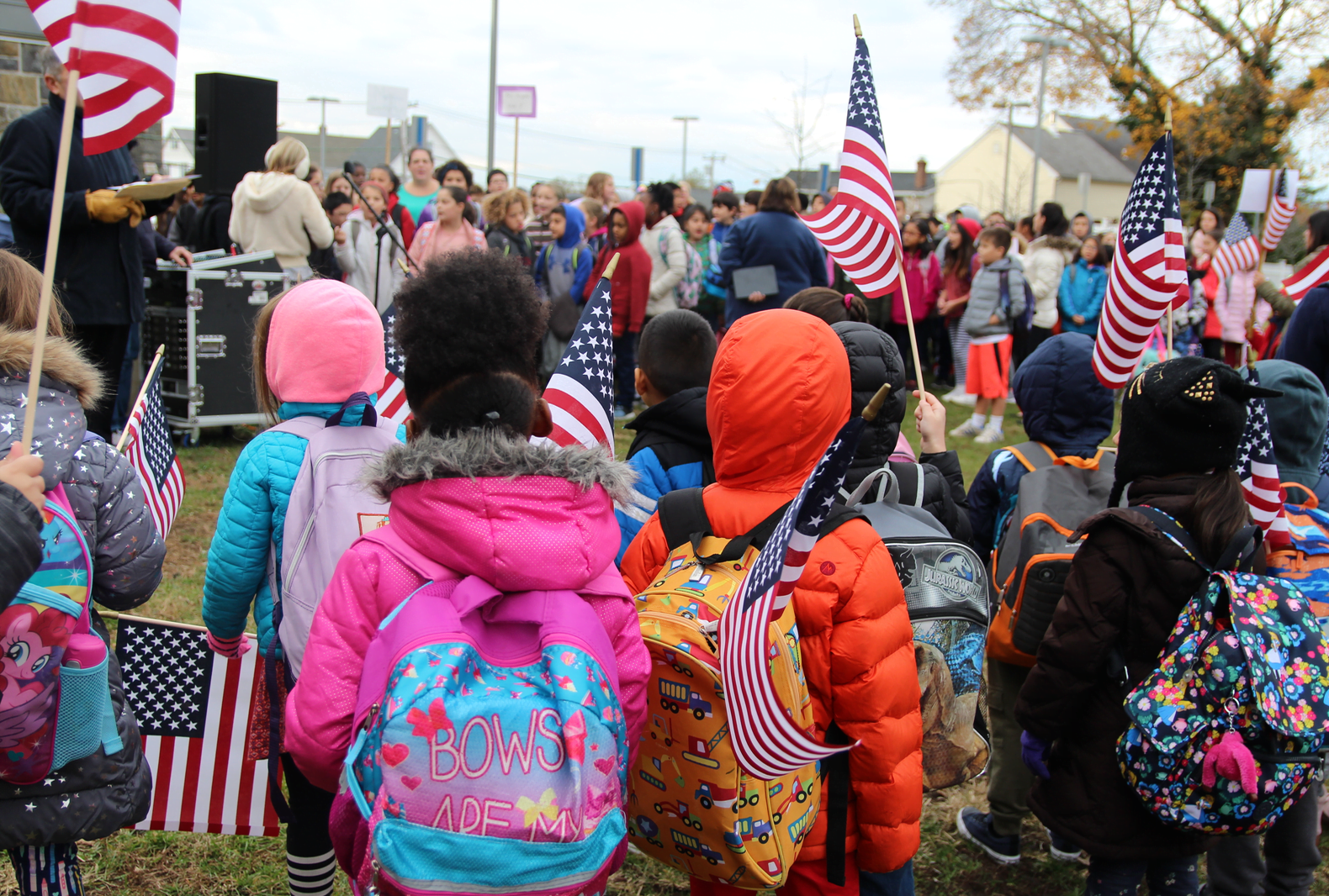 Hamilton Avenue School children waived American flags before pledging allegiance and meeting local veterans and service members. Nov 9, 2018 Photo: Leslie Yager