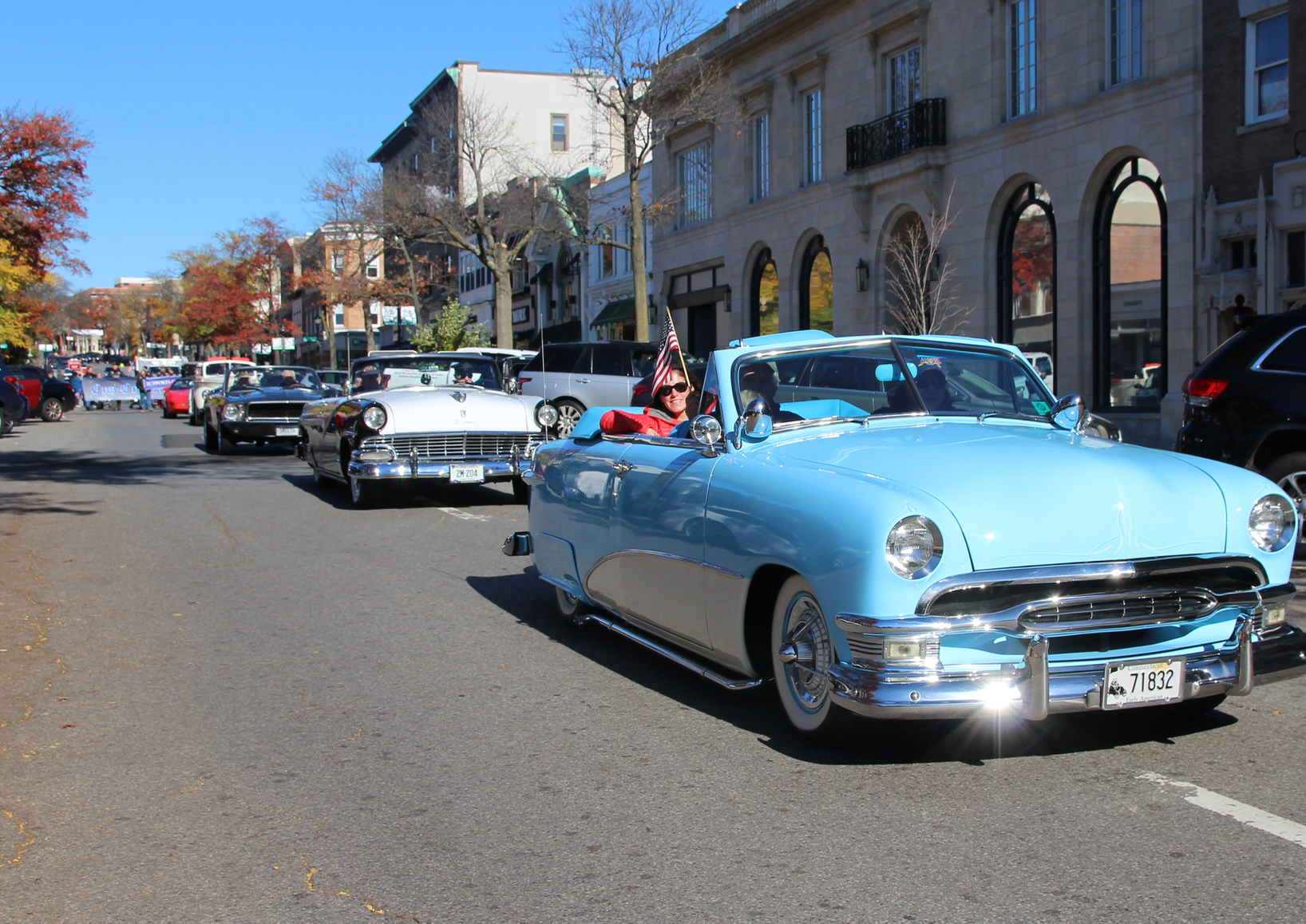 Riding in antique cars, many veterans moved along Greenwich Avenue, past Greenwich's impressive collection of monuments. Nov 11, 2018 Photo: Leslie Yager