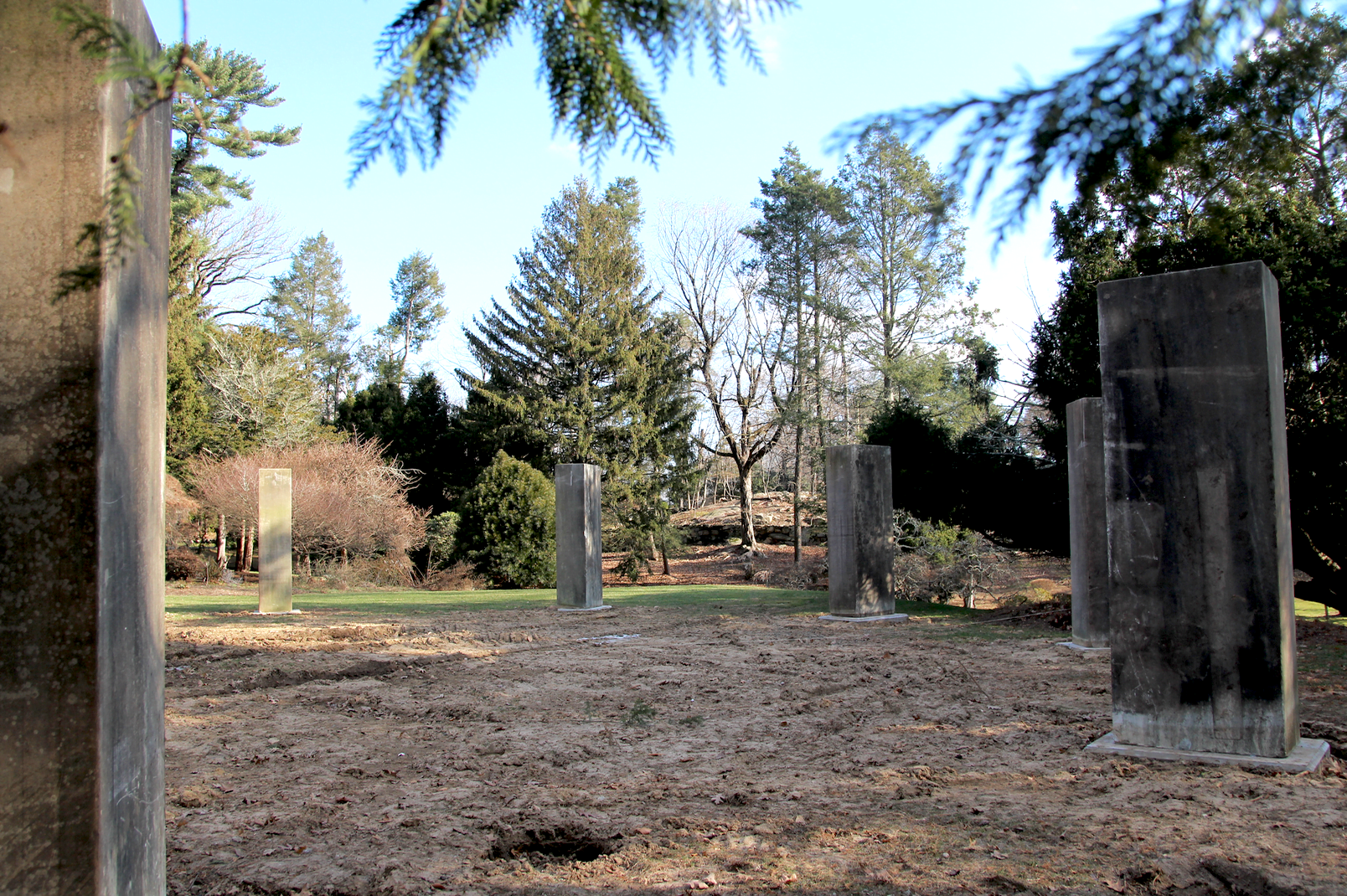 The the Montgomery Pinetum, one view of the six marble monoliths from the O'Neill outdoor ampitheater at Lia Fail Way. Dec 8, 2018 Photo: Leslie Yager