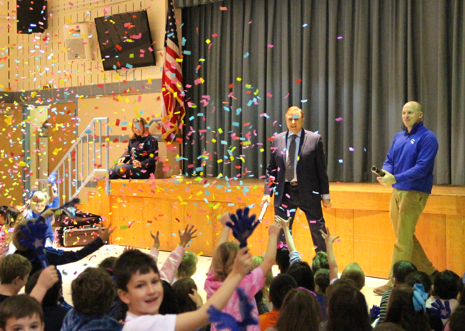 Principal Gene Schmidt and assistant principal Michael Reid shot confetti in the air in celebration of the timely reconstruction following a flood in October. Jan 2, 2019 Photo: Leslie Yager