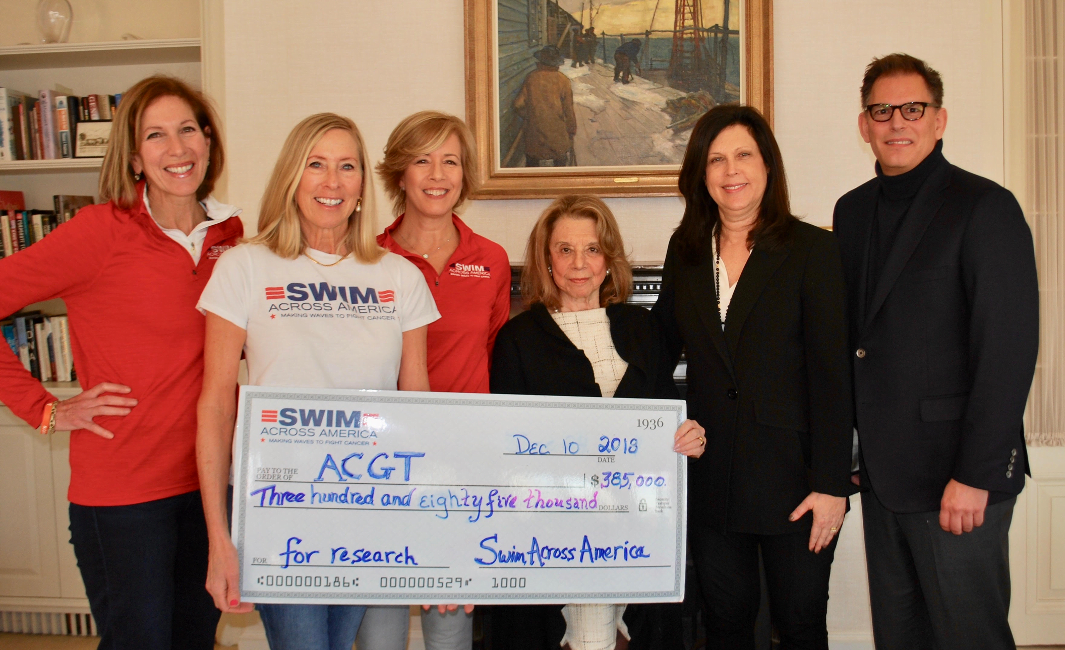 Swim Across America co-chairs Michele Graham, Lorrie Lorenz and Nancy Carr with ACGT honorary Board chairman and co-founder Barbara Netter, ACGT executive director Margaret Cianci and CEO and president of ACGT, Kevin Honeycutt. 
