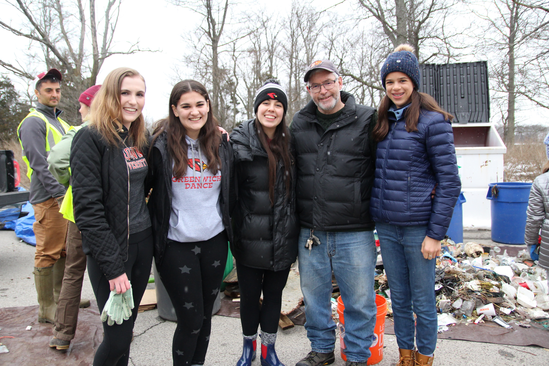 Left to right Greenwich High School Environmental Action Club students who participated in the beach clean up, Jeanette Petit (12), Madelyn Yu (12), Renata Malyshev (12) and Isabelle Abbasi (11) with advisor Robert Conlan. March 3, 2019 Photo: Leslie Yager