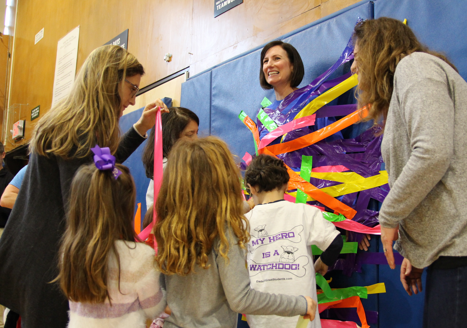 Principal Jill Flood was taped to the wall at North Street School after a successful "pennies for patients" drive to benefit Leukemia & Lymphoma Society. March 22, 2019 Photo: Leslie Yager