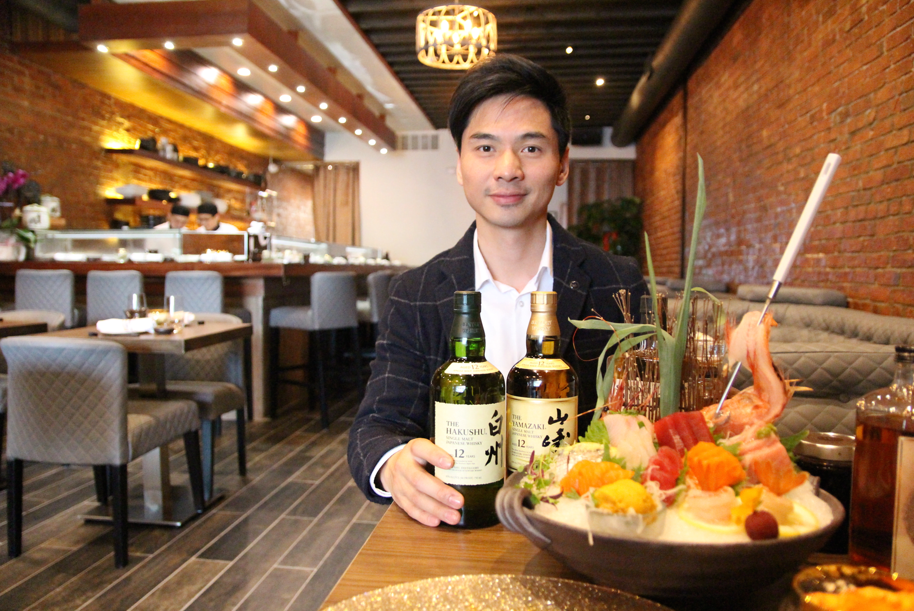 K Dong at his successful restaurant on Greenwich Avenue, Miku Sushi. Photo: Leslie Yager