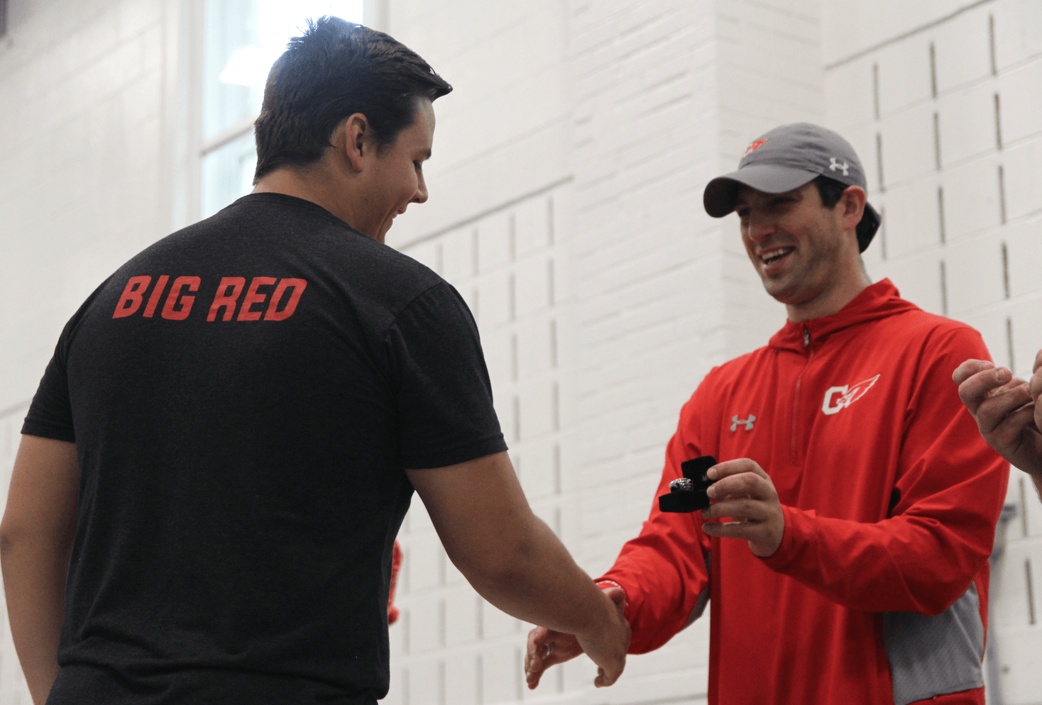 Following the clinic on the turf field at the Boys & Girls Club the Cardinals head coach presented rings during a ceremony in side the field house, a new tradition for the team. May 19, 2019 Photo: Leslie Yager