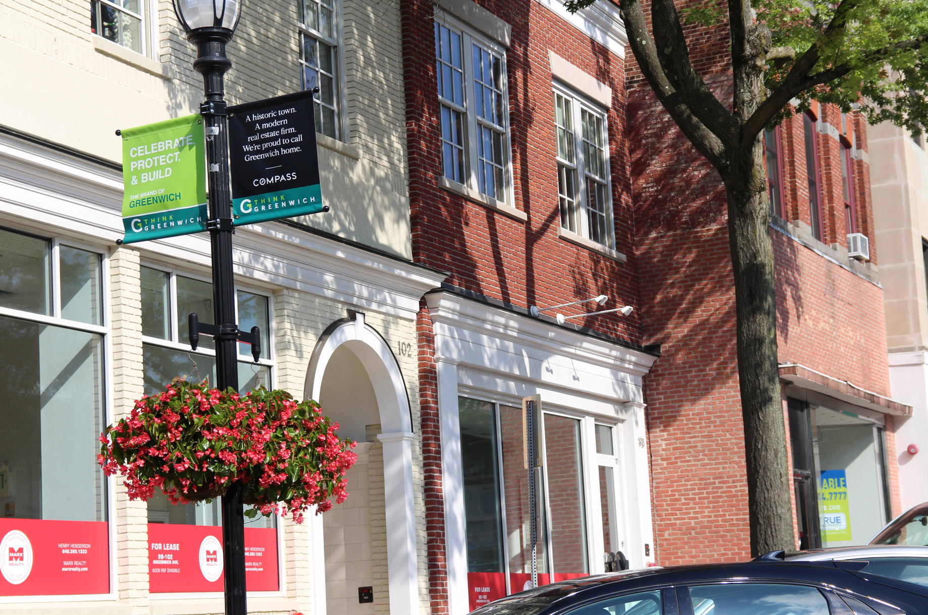 ThinkGreenwich banners hang from lamp posts on Greenwich Avenue. Aug 15, 2019 Photo: Leslie Yager