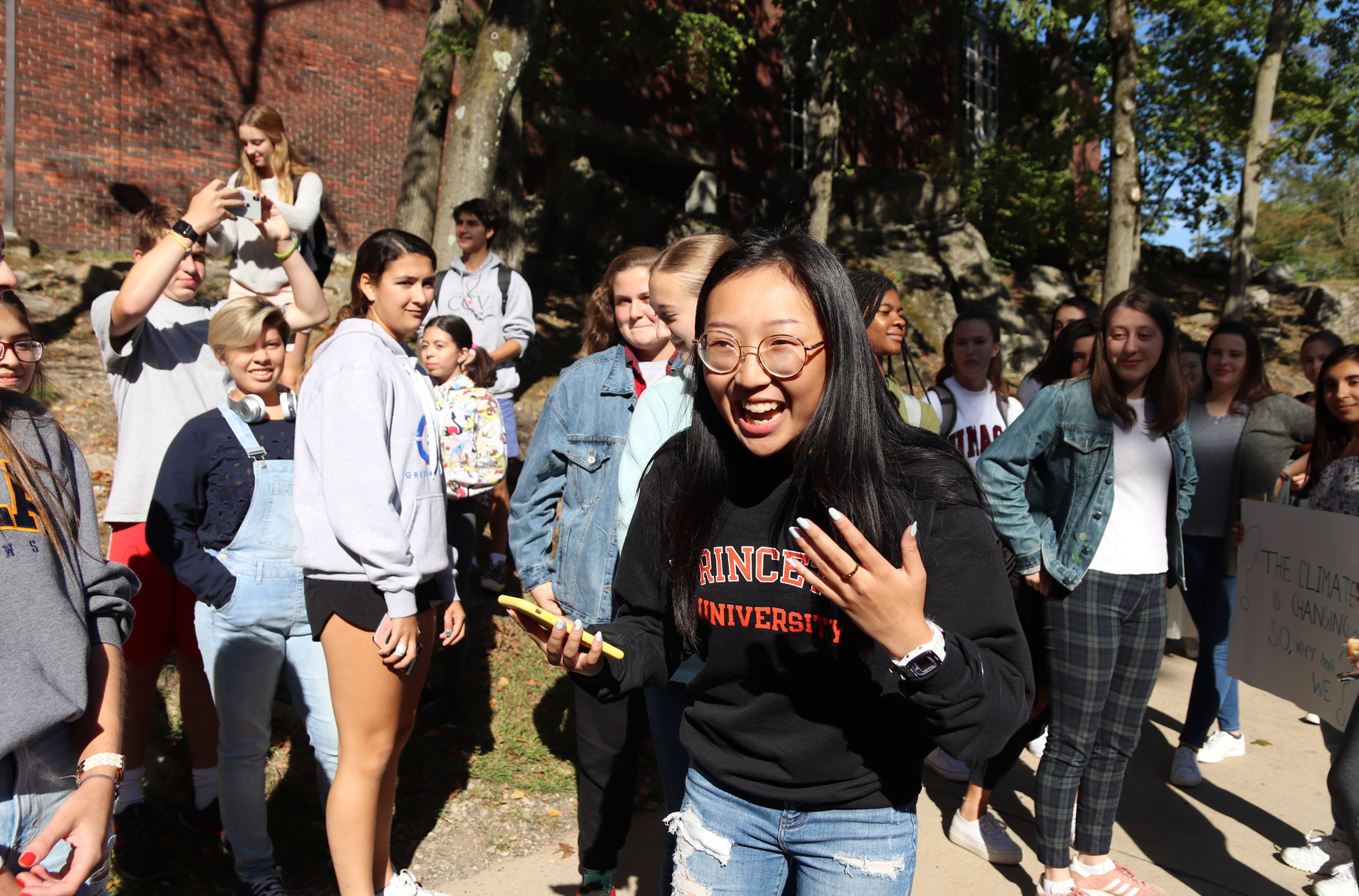 During a student walk out on Friday, Victoria Fu urged students to use their voices to demand action on climate change. Sept 19, 2019 Photo: Leslie Yager