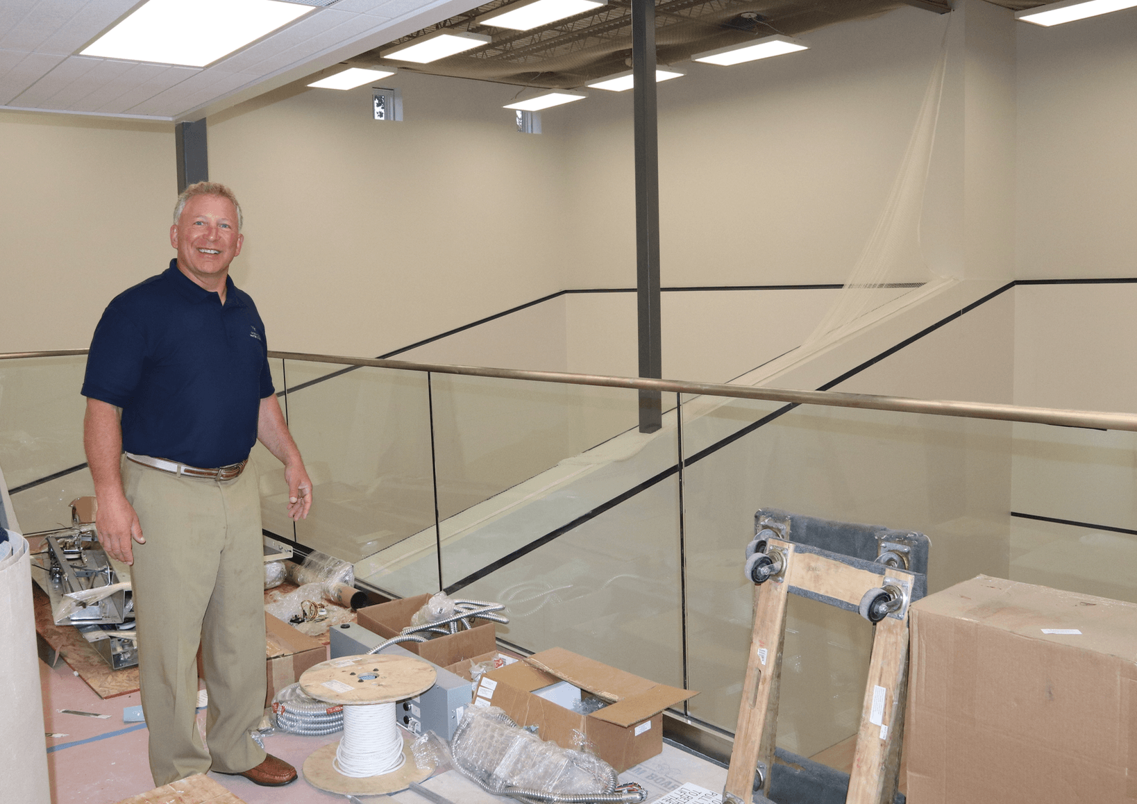 Rick Kral supervising finishing touches at Greenwich Water Club's new squash facility on River Road. The three singles and one doubles courts are the product of an addition at the rear of the historic mansion, which will now serve as a clubhouse. Photo: Leslie Yager