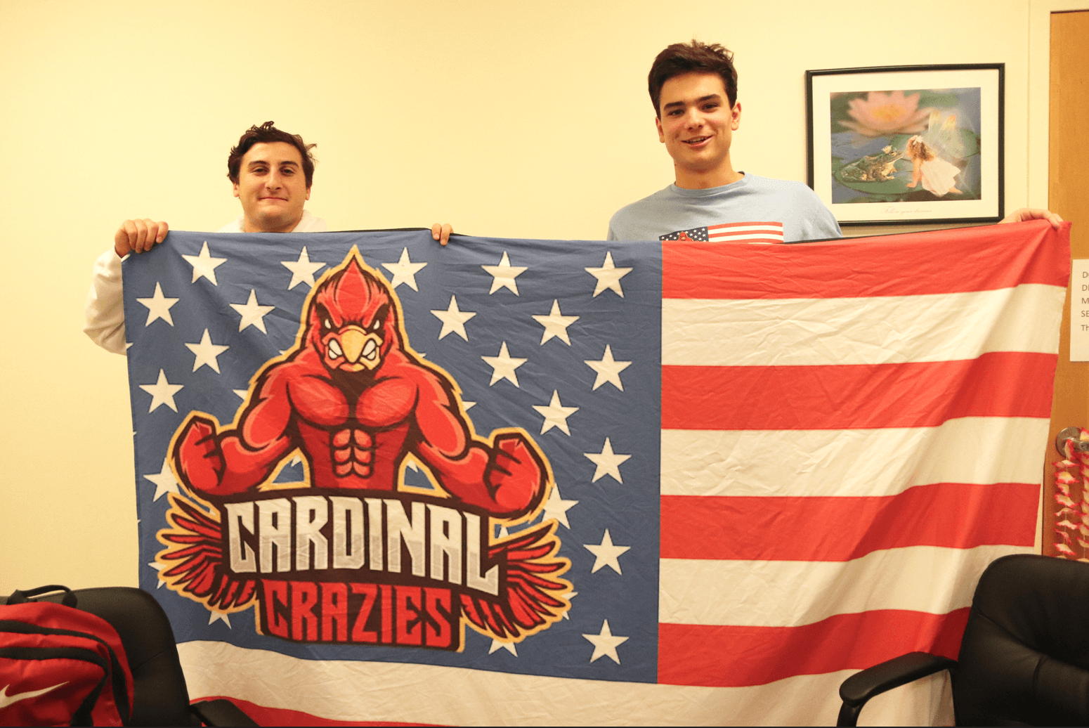 Michael Grabel and Jack Doss with their Cardinal Crazies flag.Oct 11, 2019 Photo: Leslie Yager