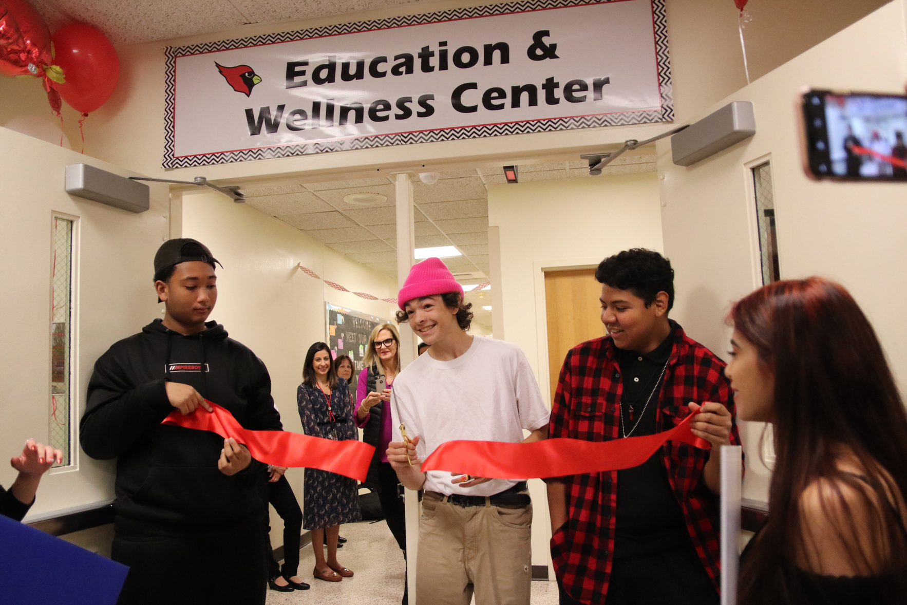 GHS sophomore Jesse Gallagher had the honor of cutting the ribbon at Greenwich High School's new Wellness Center. Oct 8, 2019 Photo: Leslie Yager