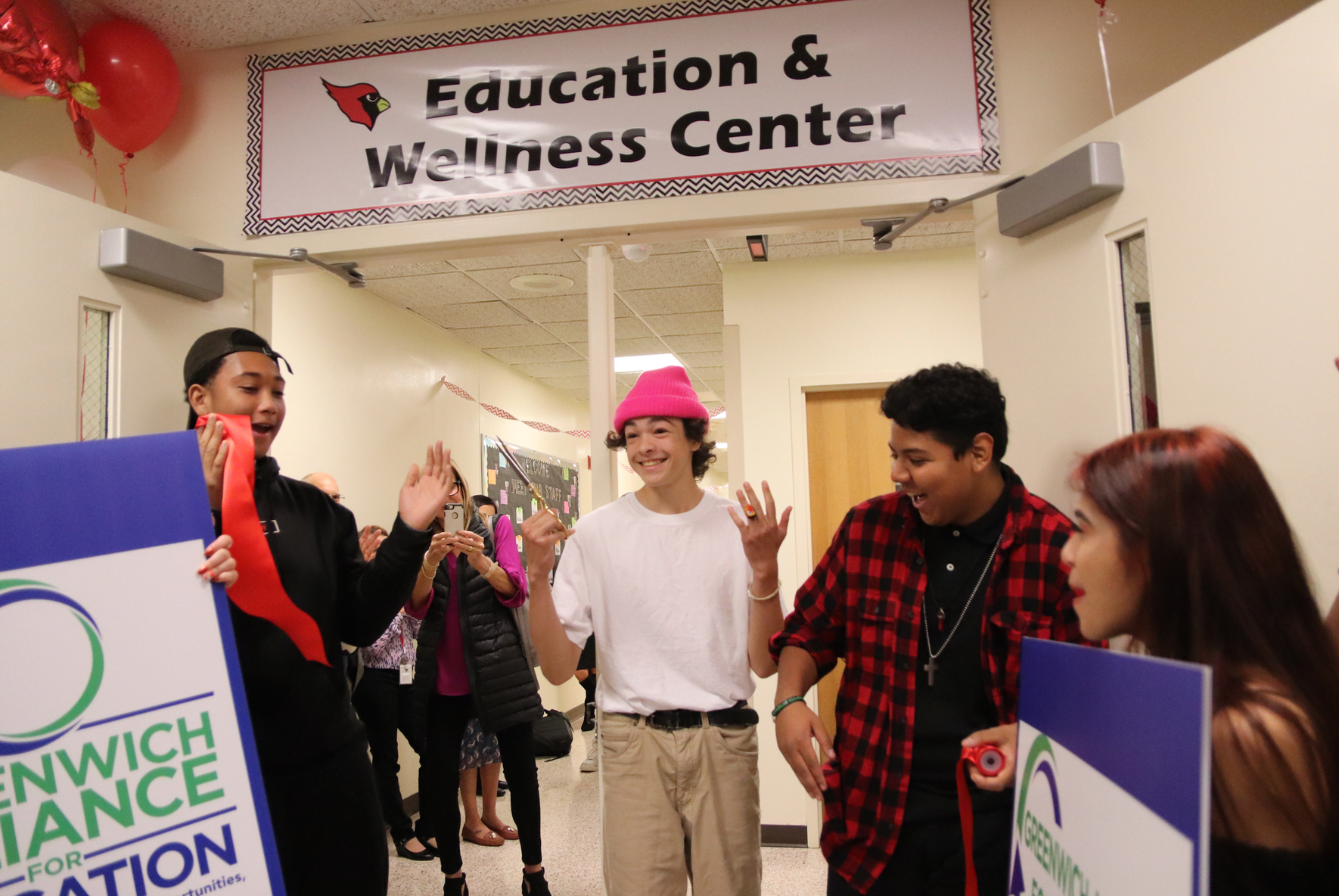 GHS sophomore Jesse Gallagher had the honor of cutting the ribbon at Greenwich High School's new Wellness Center. Oct 8, 2019 Photo: Leslie Yager