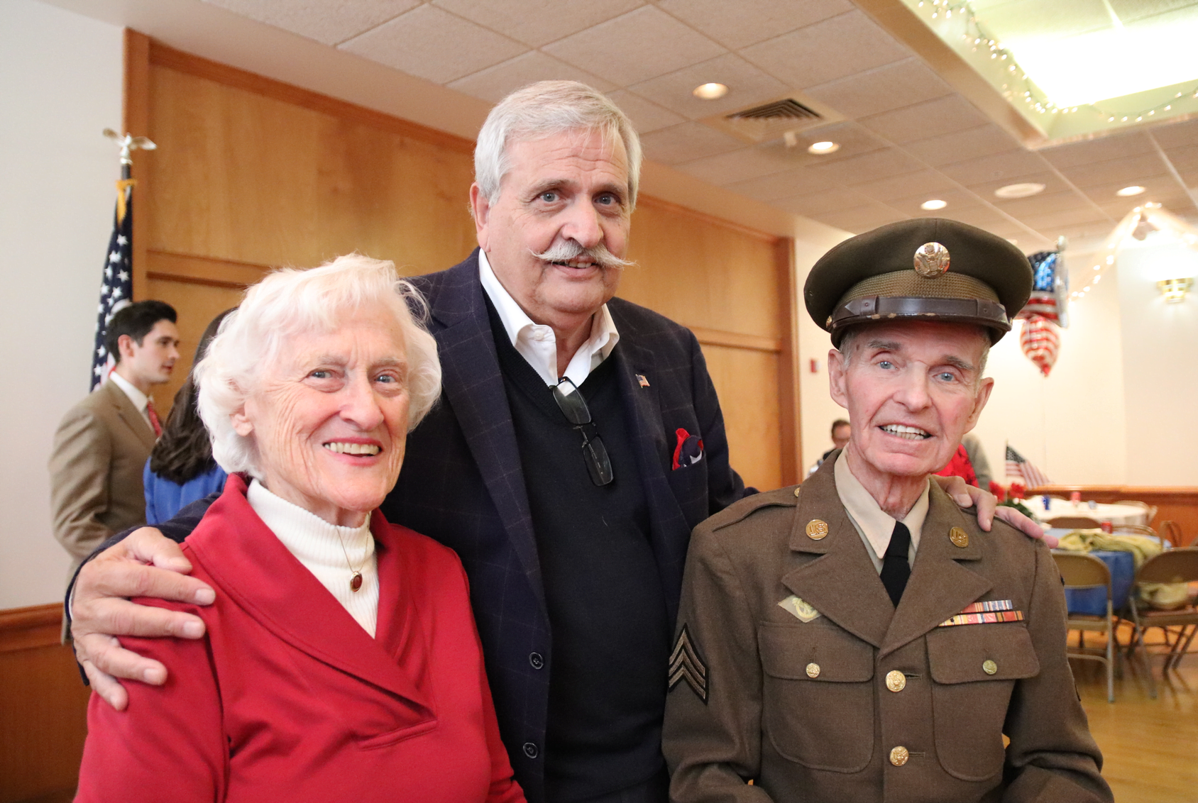 Nancy and George Chelwick with Dave D'Andrea at Redmen's Hall where the USO Show Troupe performed at a luncheon for Veterans Day. Nov 11, 2019 Photo: Leslie Yager