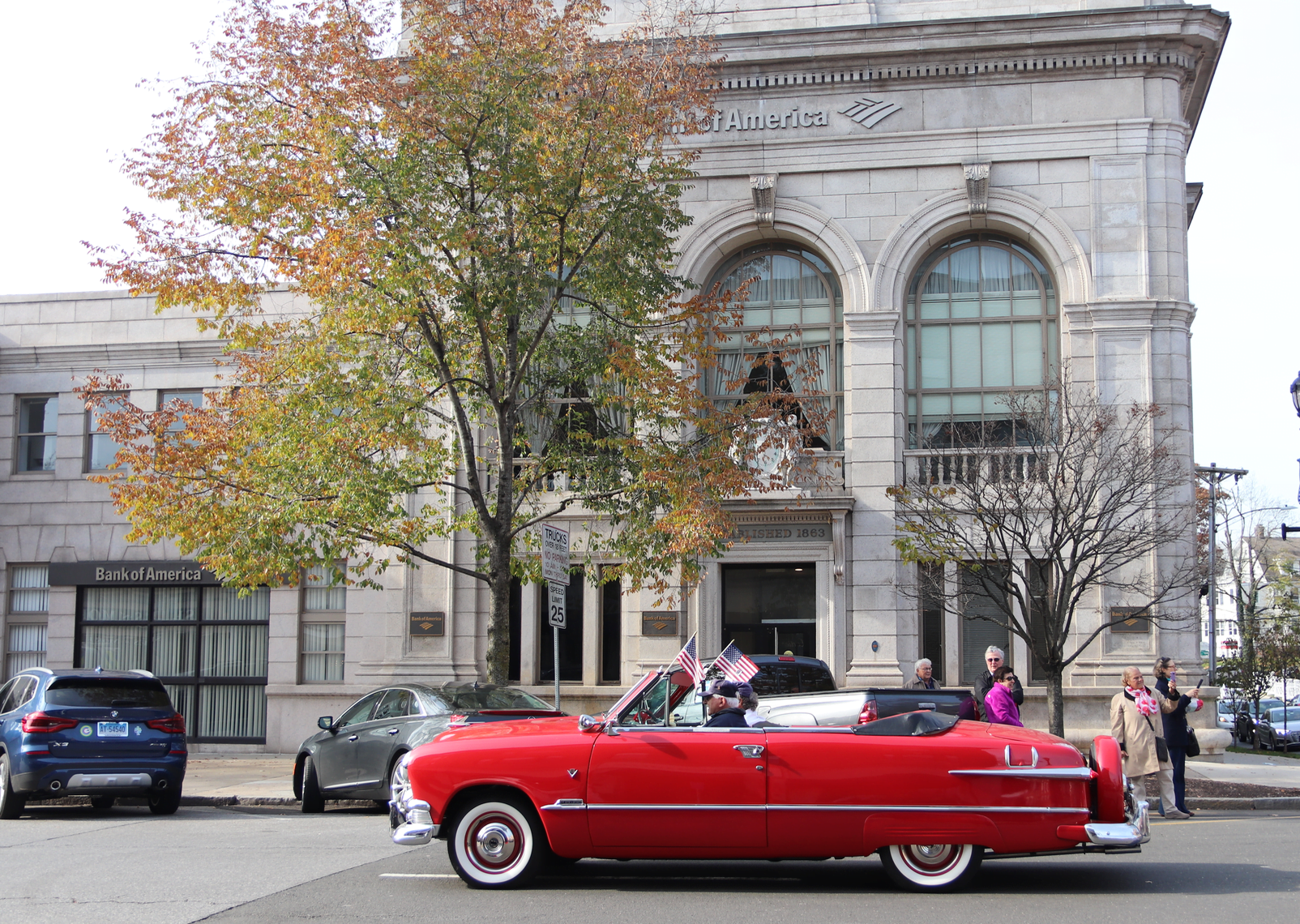 Veterans rode in vintage cars down Greenwich Avenue during the Patriotic Walk on Nov 11, 2019. Photo: Leslie Yager