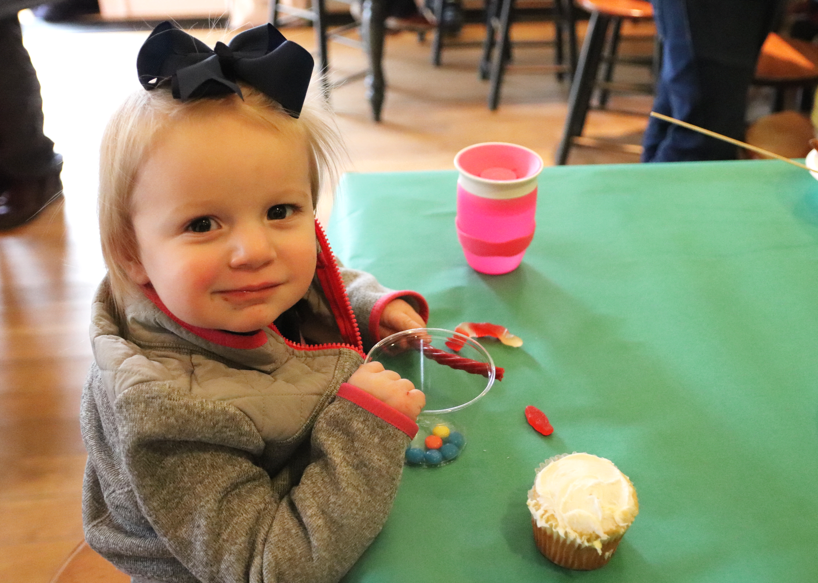 Bettie Bucher, 17 months, of Harrison, NY, plots out her strategy for cupcake decorating. Feb 16, 2020 Photo: Leslie Yager