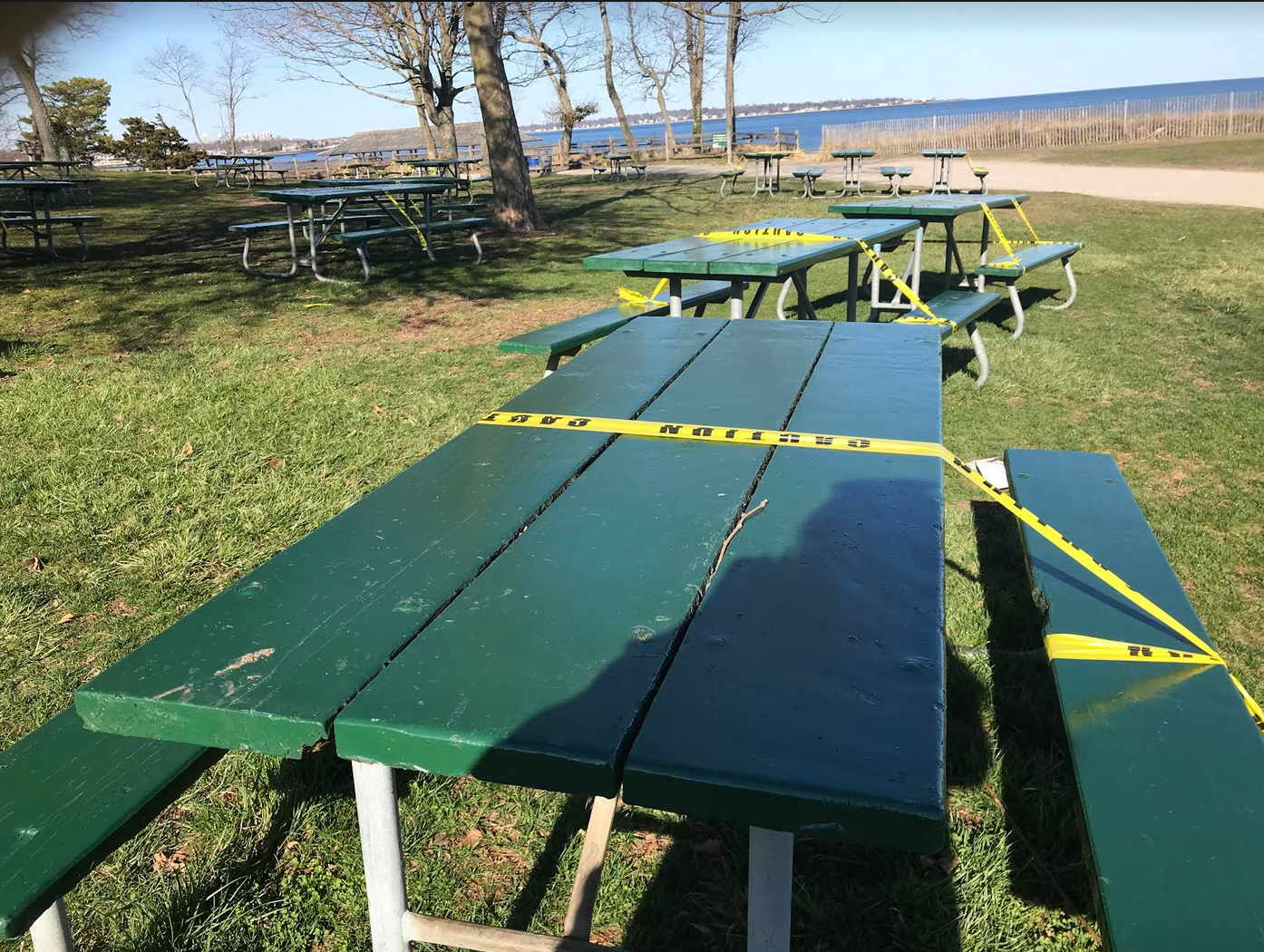Picnic tables had caution tape at Tod's Pt. Saturday, March 21, 2020 Photo: Leslie Yager