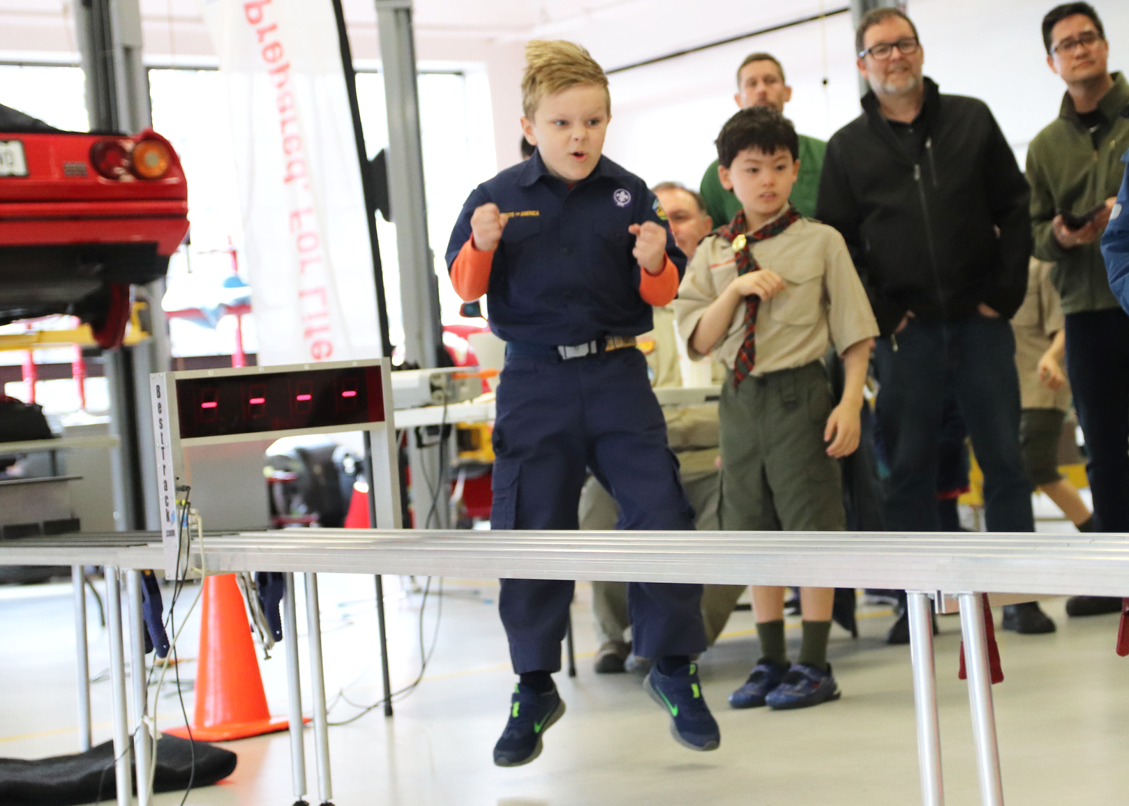 James Henry was enthusiastic as his car approached the finish line on the track installed at Miller Motorcars. March 8, 2020 Photo: Leslie Yager