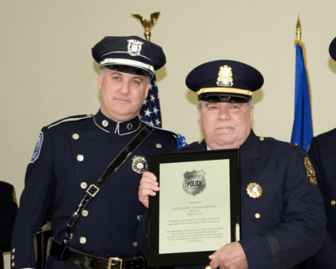 Lt Bonney and retired Lt Tommy Keegan ad a 2016 medal ceremony at the Bendheim Western Greenwich Civic Center. Photo: Leslie Yager