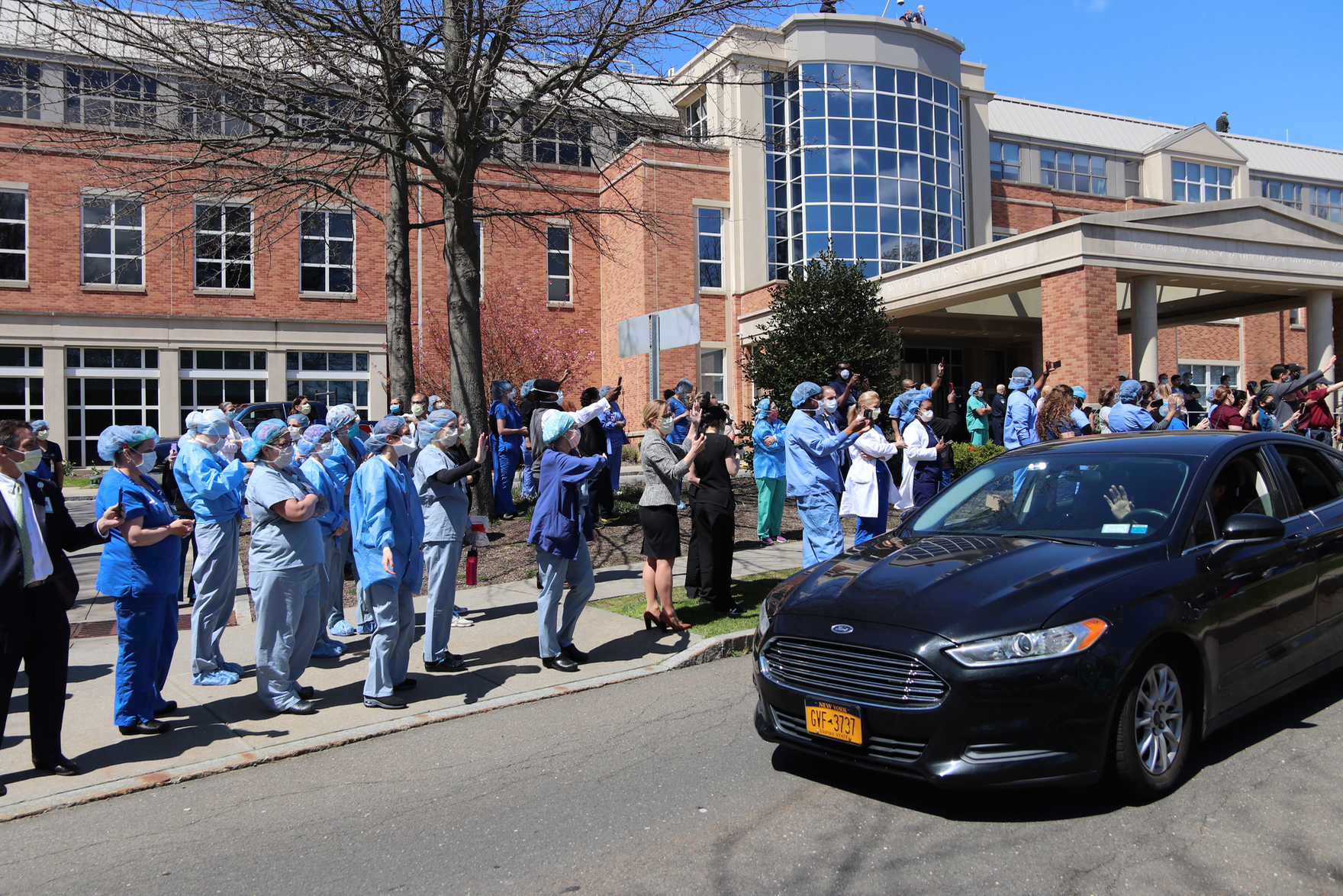 Staff outside Greenwich Hospital are honored by police, fire, ambulance personnel and the Red Cross. April 15, 2020 Photo: Leslie Yager