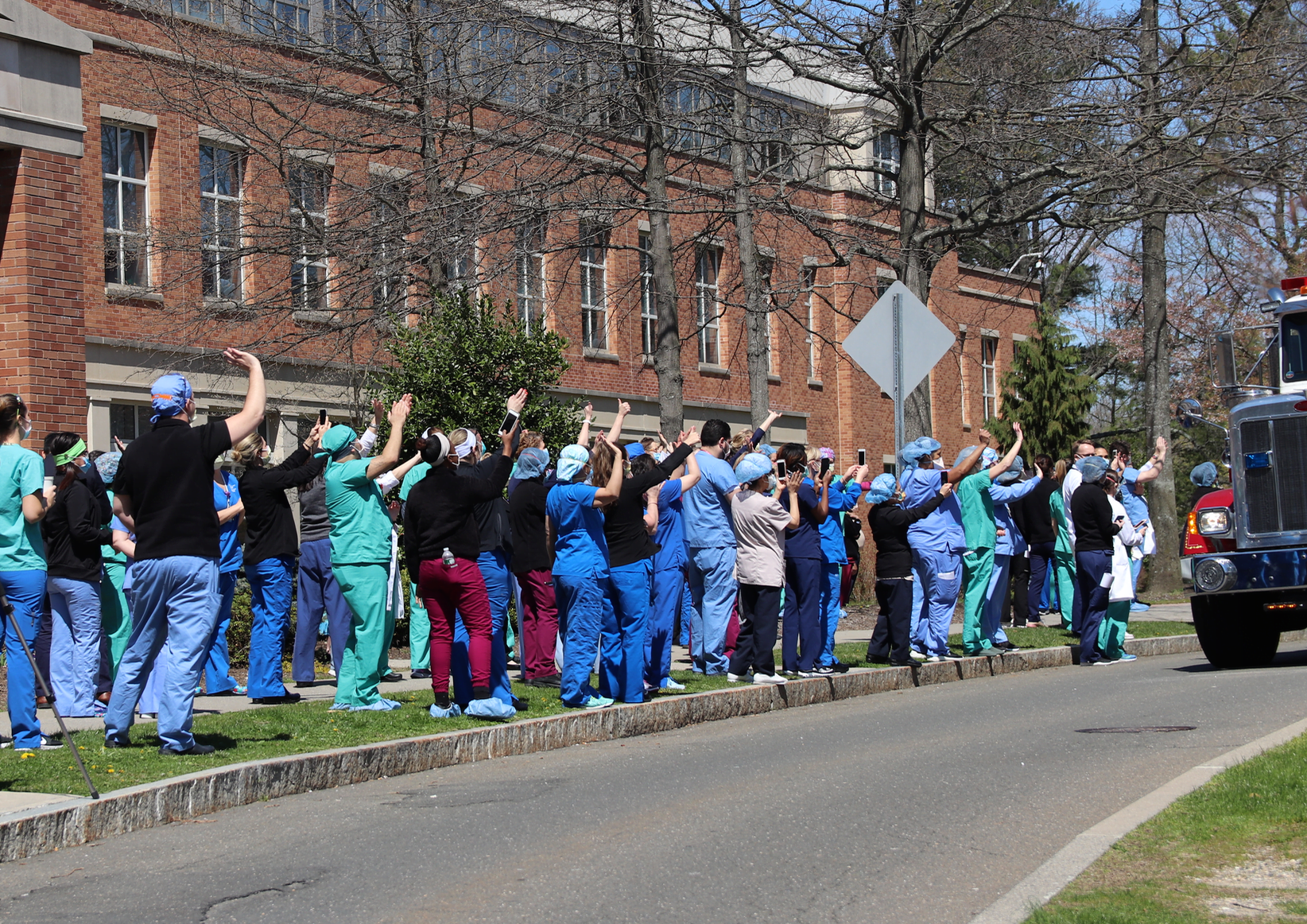 Staff outside Greenwich Hospital are honored by police, fire, ambulance personnel and the Red Cross. April 15, 2020 Photo: Leslie Yager