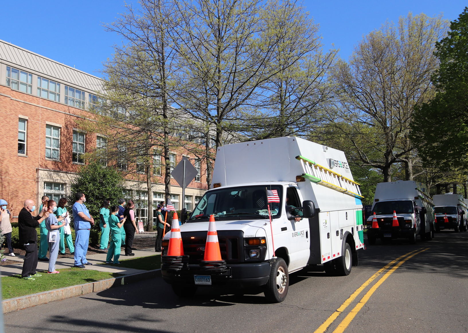 The International Brotherhood of Electrical Workers Local 420 organized 30 trucks to drive by Greenwich Hospital in a show support for frontline health care workers Monday morning. May 4, 2020 Photo: Leslie Yager