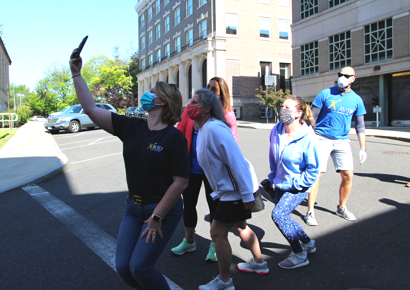 CMS teachers hadn't seen each other in person for weeks. They took a selfie outside Greenwich Police Dept. May 21, 2020 Photo: Leslie Yager