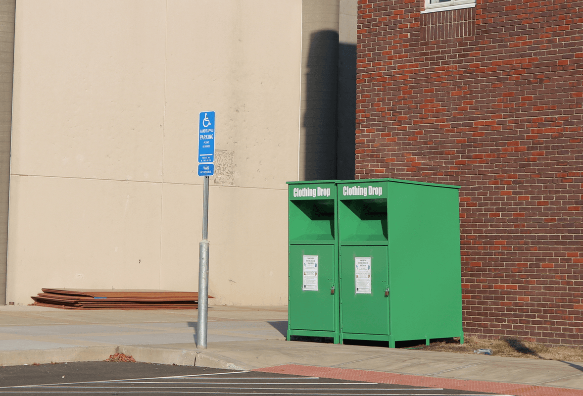 There are green donation bins in the Greenwich High School back parking lot.